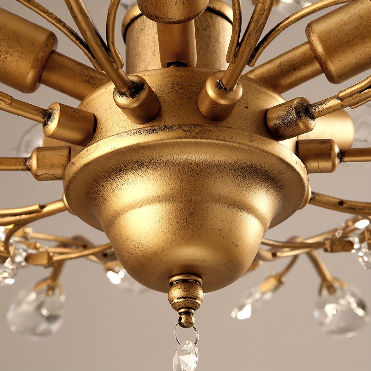 Ceiling light in antique gold with curved arms and crystal drops, perfect for vintage ceiling light fixtures