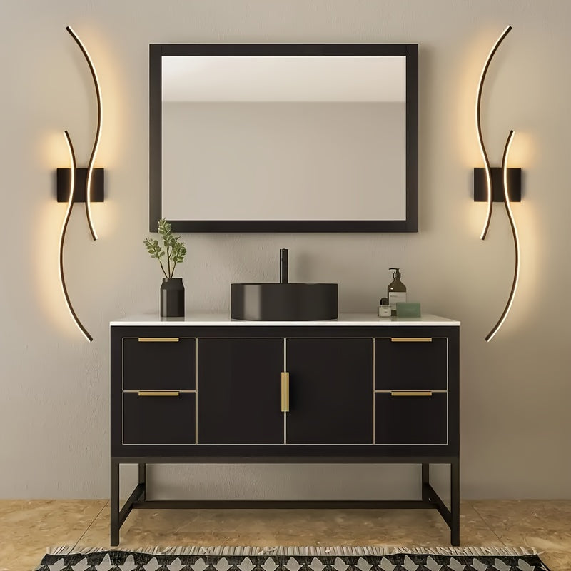 Modern bathroom vanity highlighted by two curved contemporary LED wall lights on both sides of a mirror, creating soft ambient illumination