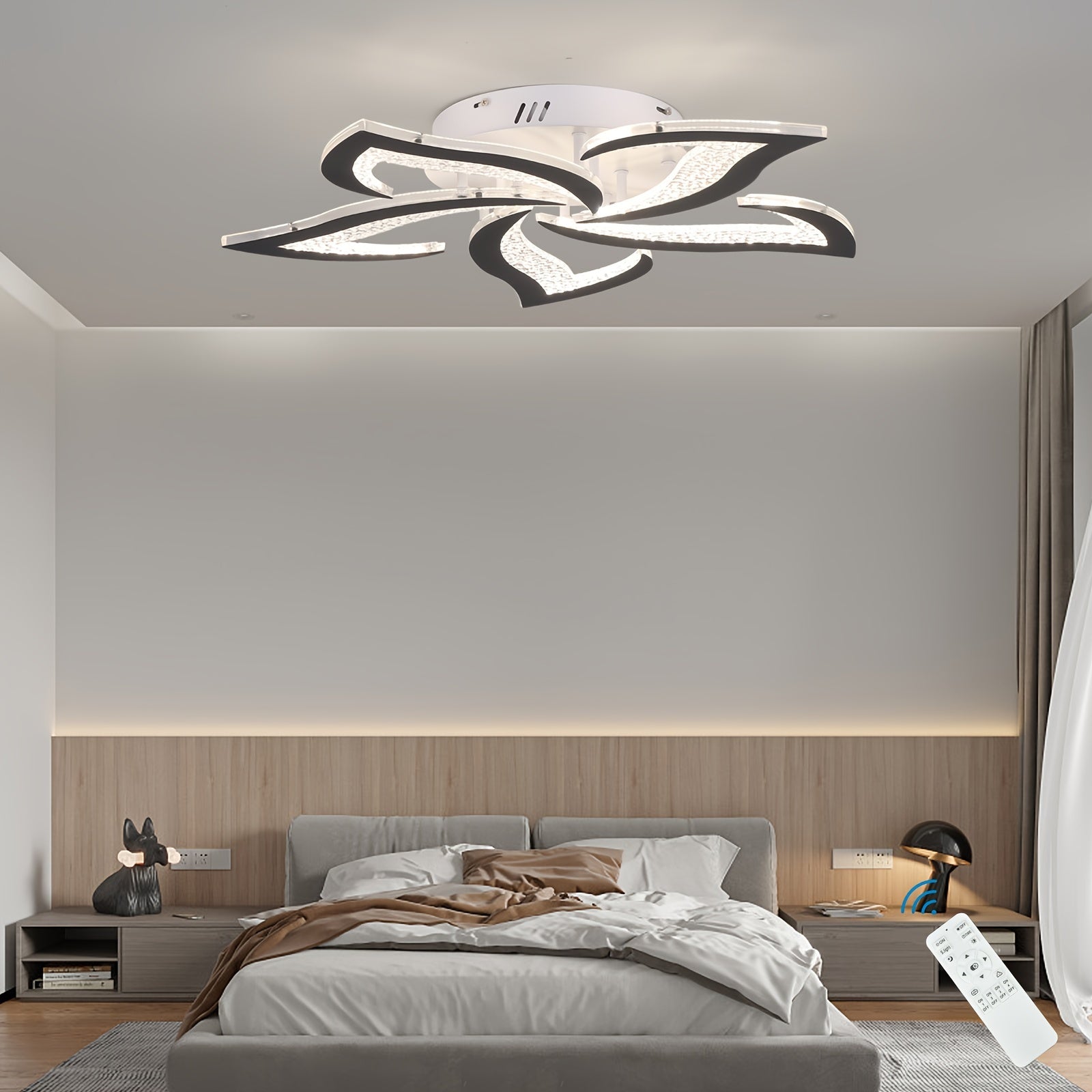 Petal-shaped LED ceiling light mounted above a neatly styled bed, featuring dimmable control via included wireless remote