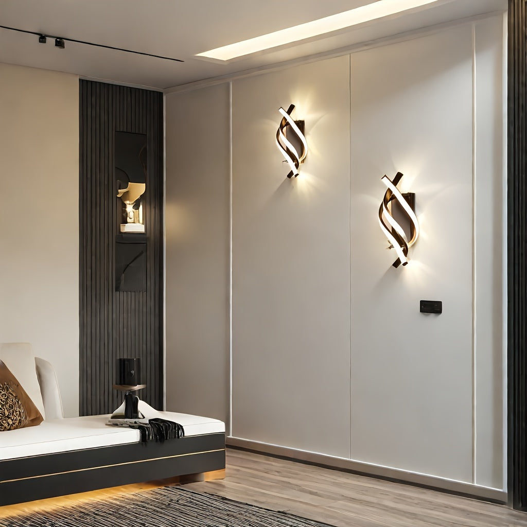 Pair of twisted LED wall sconces casting ambient light in a minimalist hallway with modern decor and wooden flooring