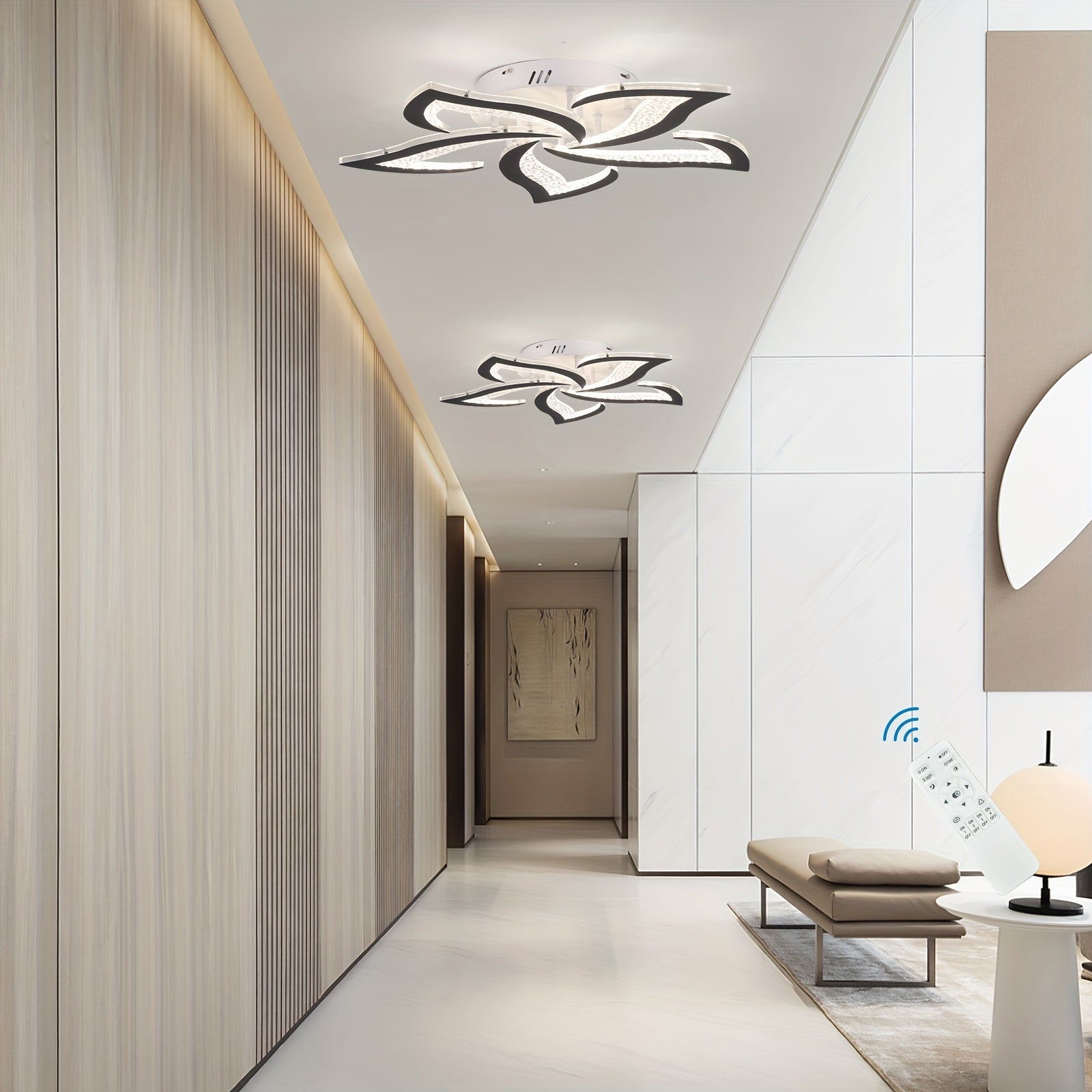Installed in a contemporary hallway, these petal-shaped LED ceiling fixtures with black trim enhance the clean and modern design