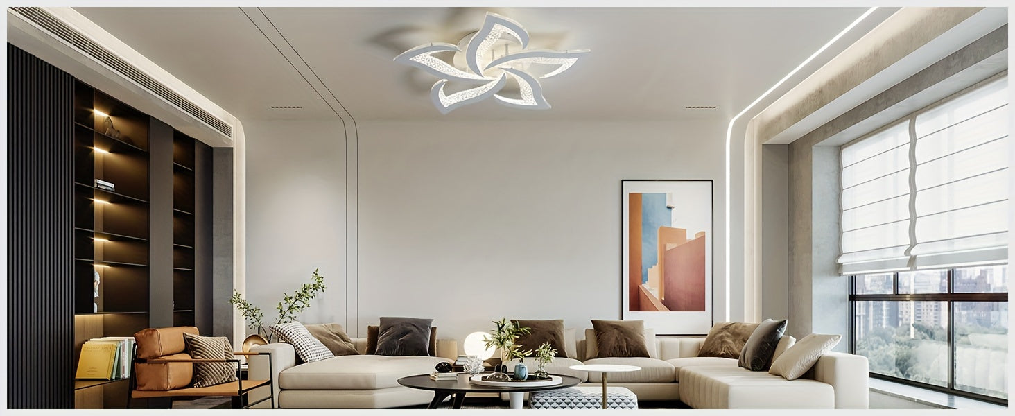 Contemporary ceiling fixture with curved LED petals, styled above a large sectional sofa and modern wall decor in a bright open space