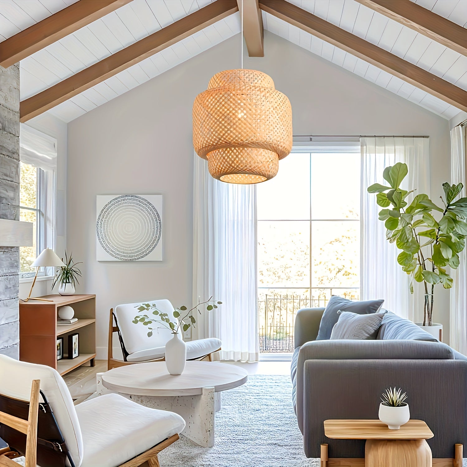Living room with a rattan-ceiling-light-fixture hanging from a vaulted ceiling, surrounded by modern furniture and natural light