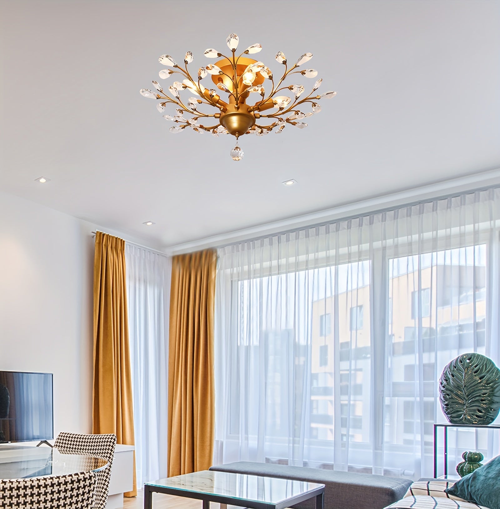 Mounted on a white ceiling, this gold crystal light brings soft shine and vintage charm to ceiling light fixtures