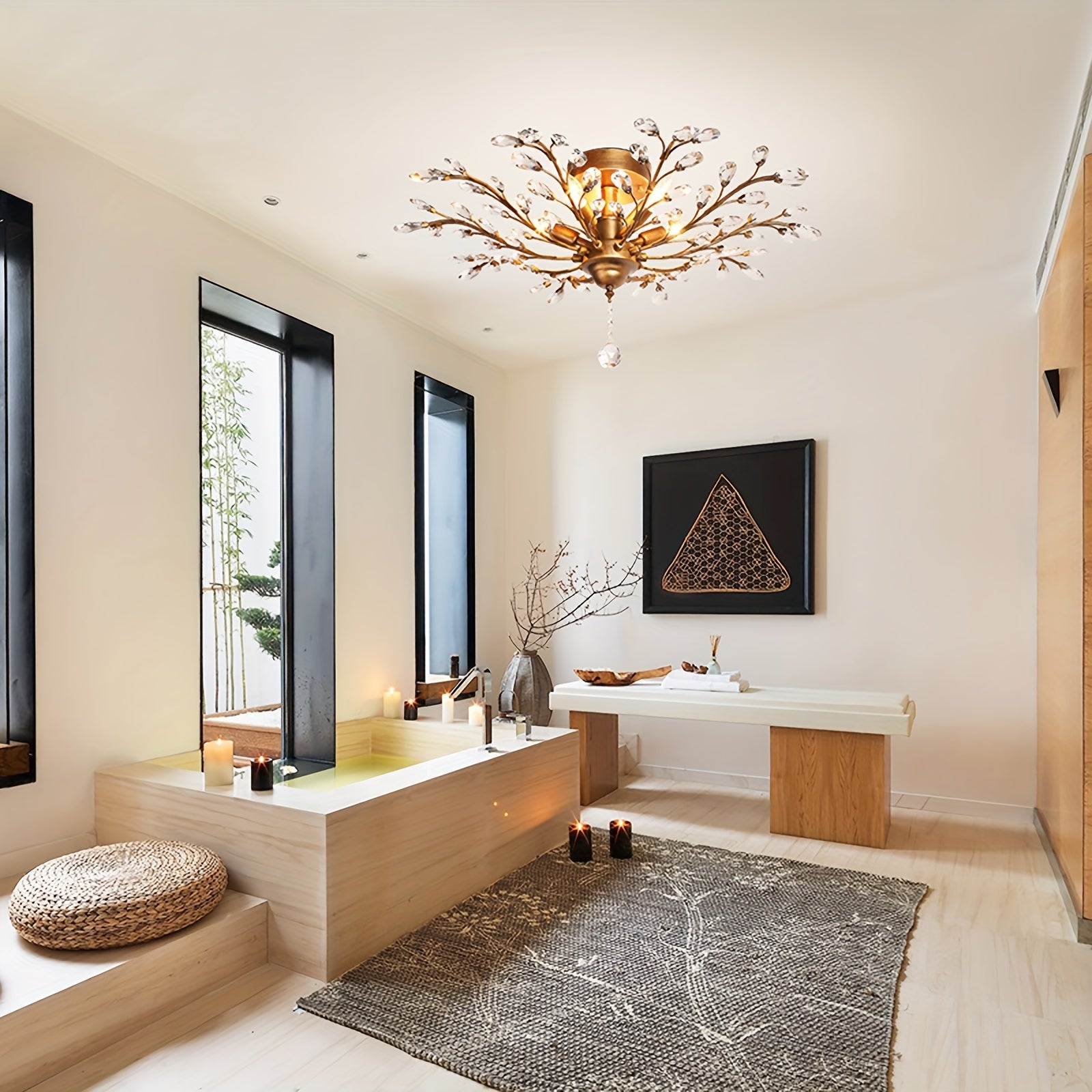 Relaxing spa-style room with a golden vintage ceiling light fixture and crystal floral branches, mounted above a soaking tub