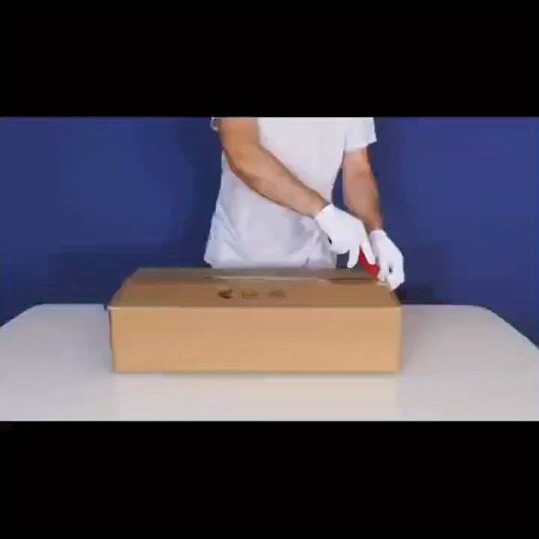 Gloved hands opening a cardboard box during the unboxing process of a light fixture, emphasizing safe handling and careful packaging