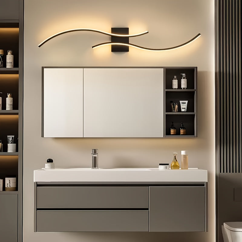Mirror cabinet setup highlighted by a wave-shaped LED wall light mounted above, casting a soft ambient glow