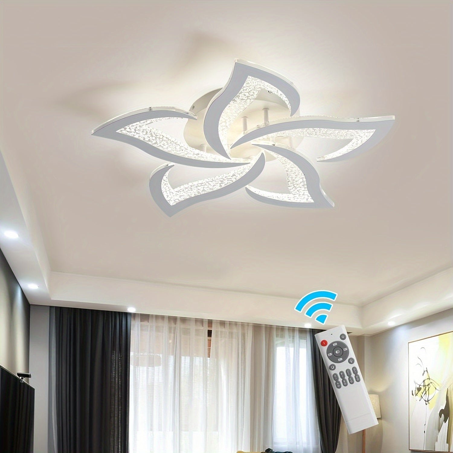 Contemporary LED fixture with petal-shaped acrylic panels and ambient glow, installed in a softly lit interior accented by sheer curtains