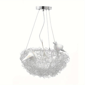Hanging pendant light with wire nest frame and two sculpted bird figures, designed for soft decorative lighting