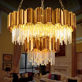 A dazzling multi-tiered crystal chandelier with golden accents, serving as a luxurious centerpiece in a beautifully furnished living room.