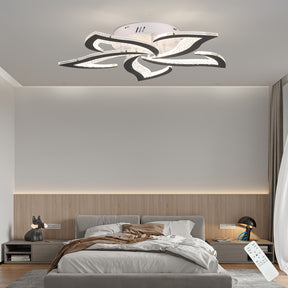 Petal-shaped LED ceiling light mounted above a neatly styled bed, featuring dimmable control via included wireless remote