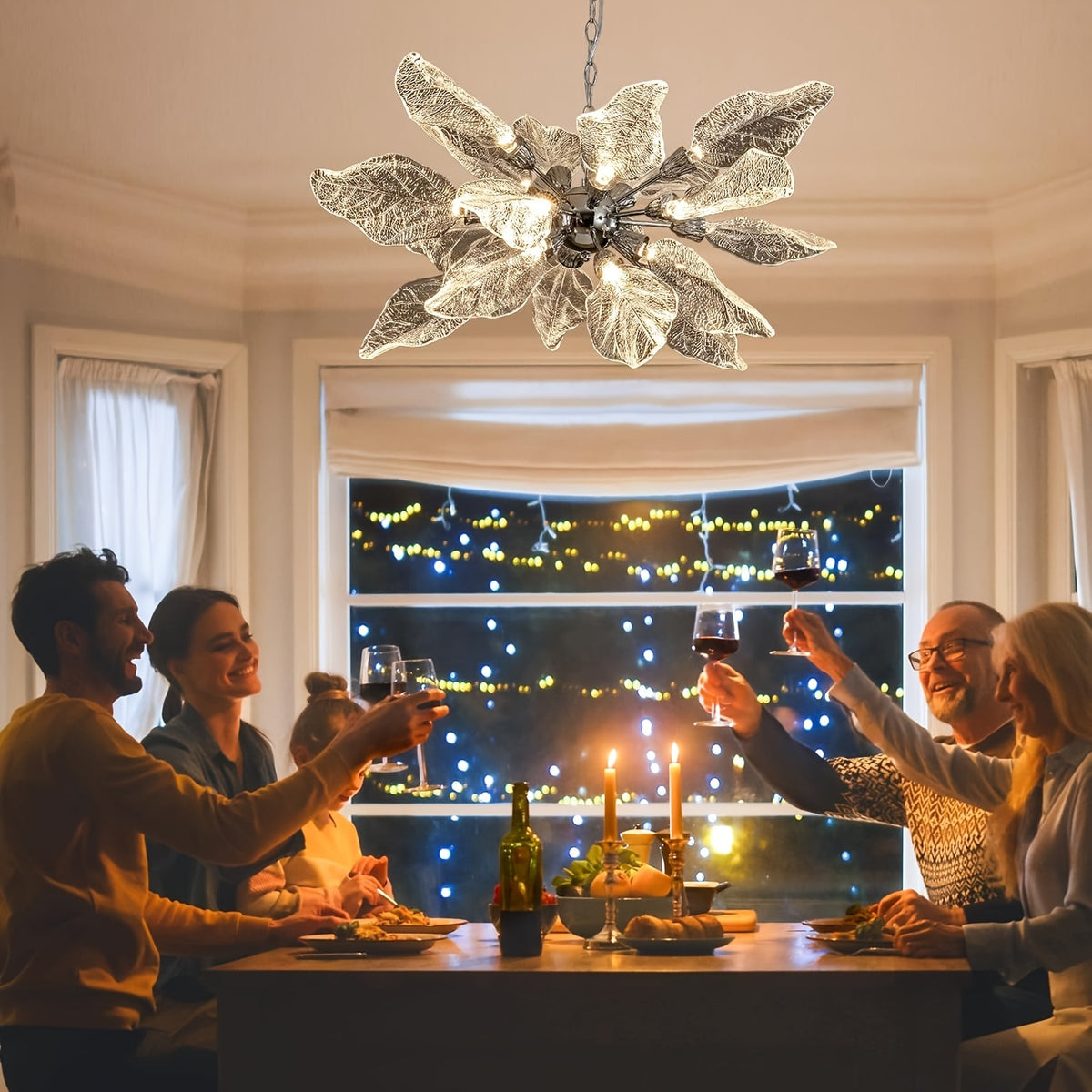 Flower-shaped light fixture illuminating a dining table where a family is toasting, creating a warm and festive atmosphere