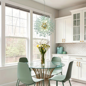 Unique dandelion-inspired chandelier with light green elements, illuminating a modern kitchen dining area with a glass table and chairs