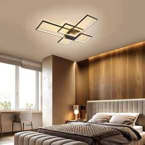 Stylish bedroom with wood panel accent wall, neutral bedding, and a black-framed LED ceiling light emitting warm illumination