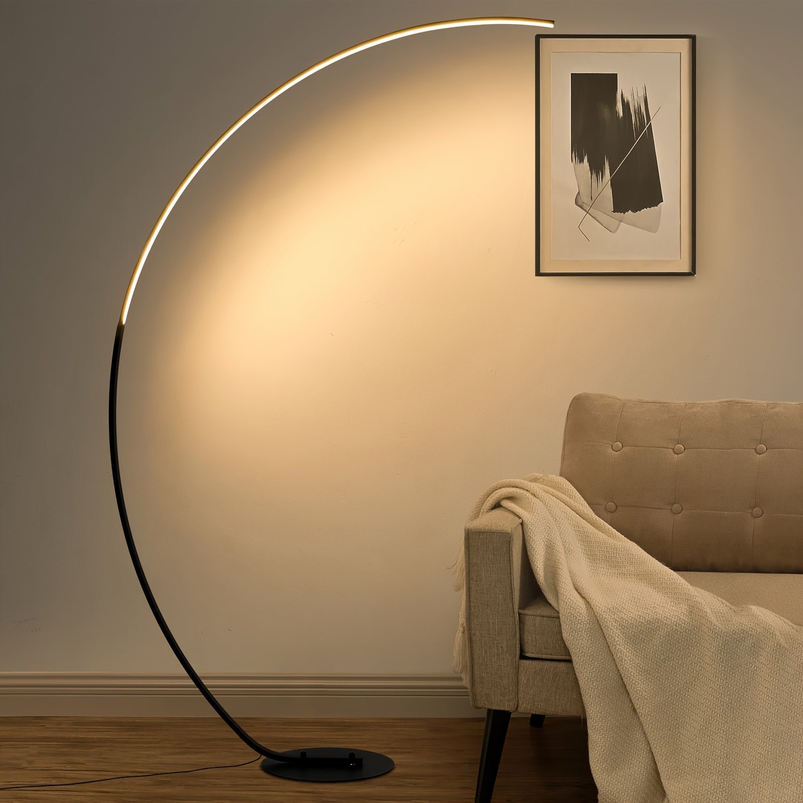 Stylish arched floor lamp with integrated LED lighting, ideal for illuminating living room seating areas and adding a modern touch.