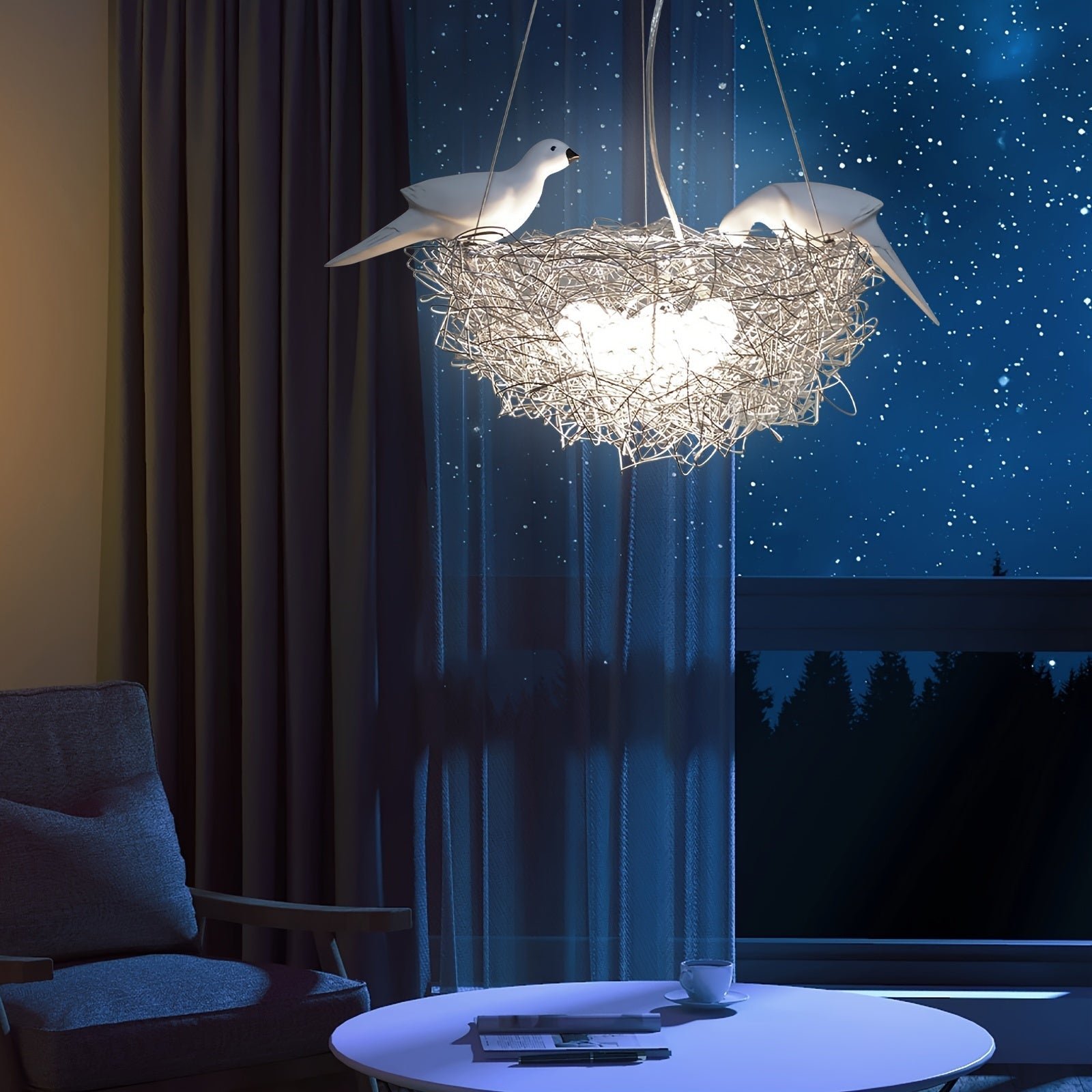 Softly glowing pendant light with sculpted bird accents, shown in a cozy nighttime interior beside a window with a starry sky view