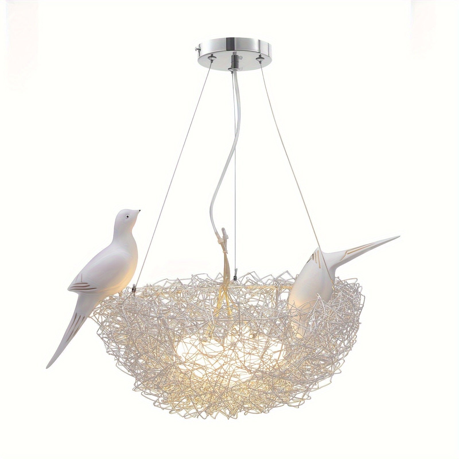 Pendant light with aluminum nest design and two sculpted birds, glowing softly against a plain white background