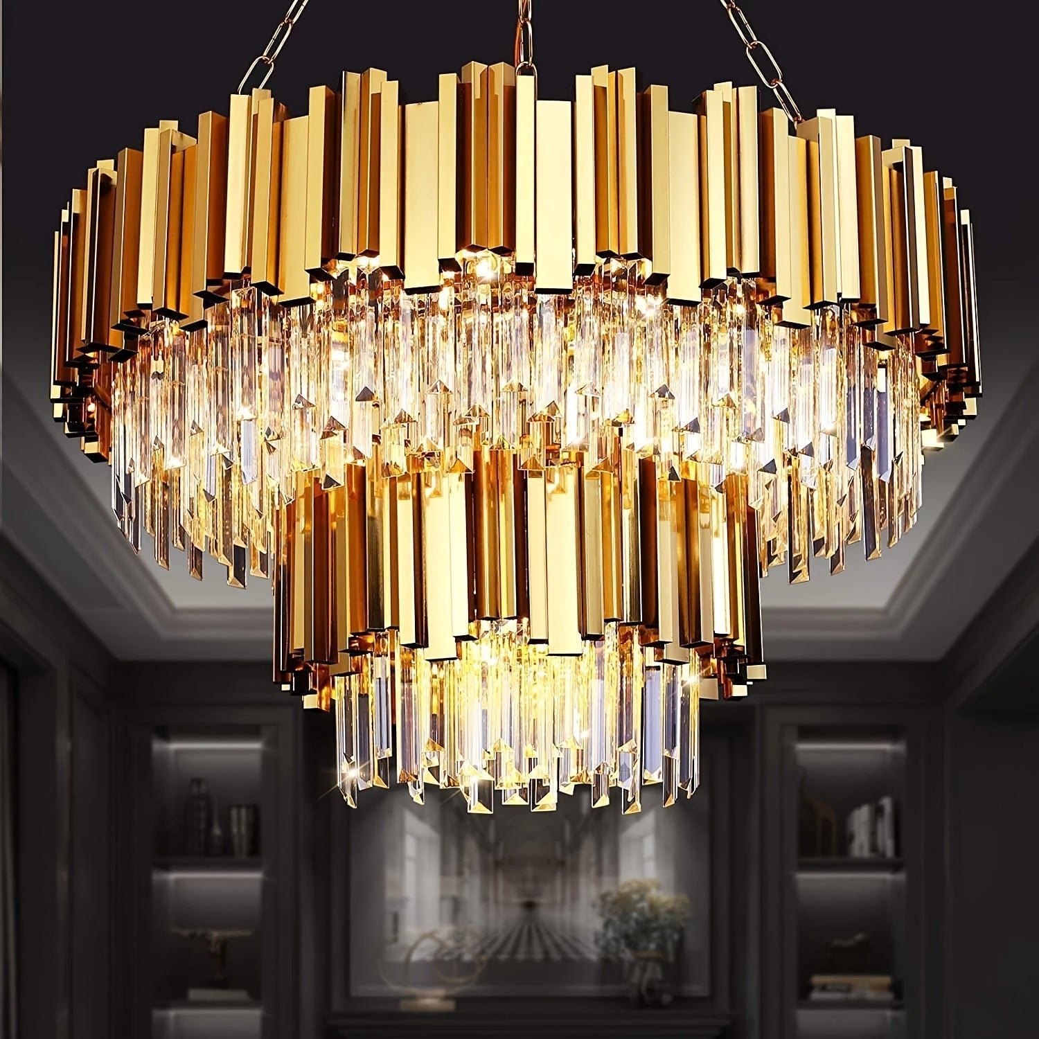 Statement gold chandelier with layered crystal prisms and 17 lights, adding a dramatic glow to a refined interior space