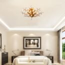 Elegant bedroom with a gold vintage ceiling light fixture featuring crystal accents and floral design, adding charm to a classic interior